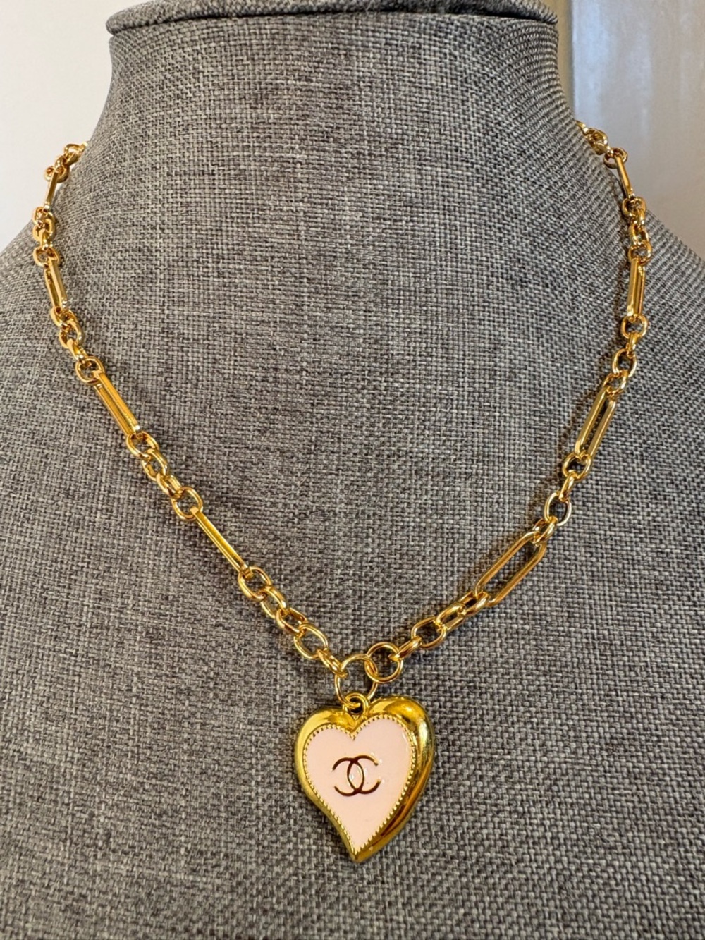 Authentic Chanel heart charm with pink enamel center on 18 karat gold 18" chain